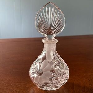 Etched floral perfume bottle